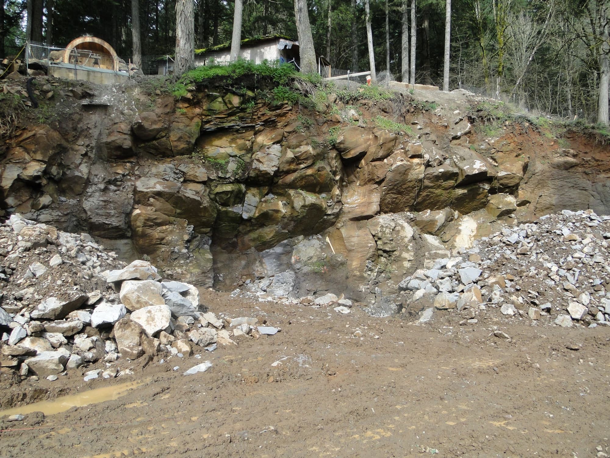 Blasted rock hillside excavation