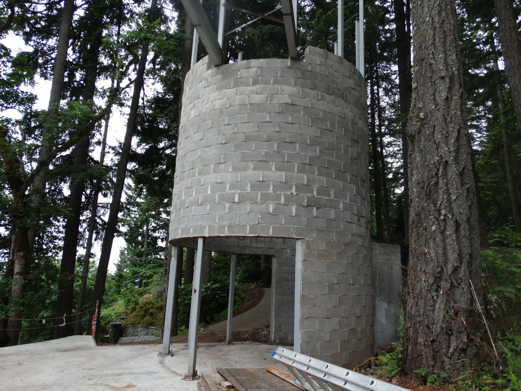 Cinderblock tower construction forest