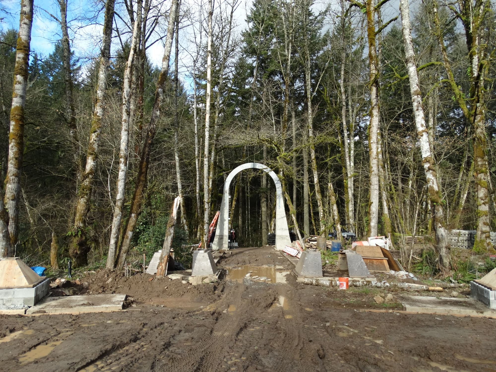 Concrete arch muddy worksite