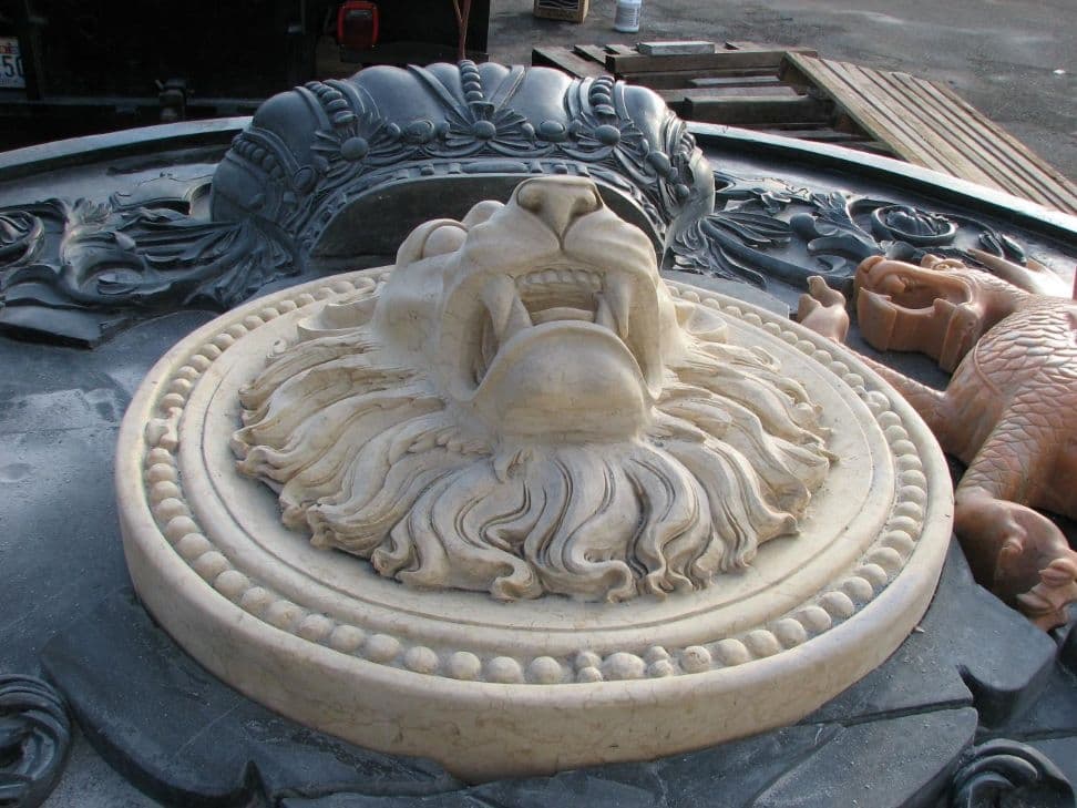 Lion head medallion crest detail
