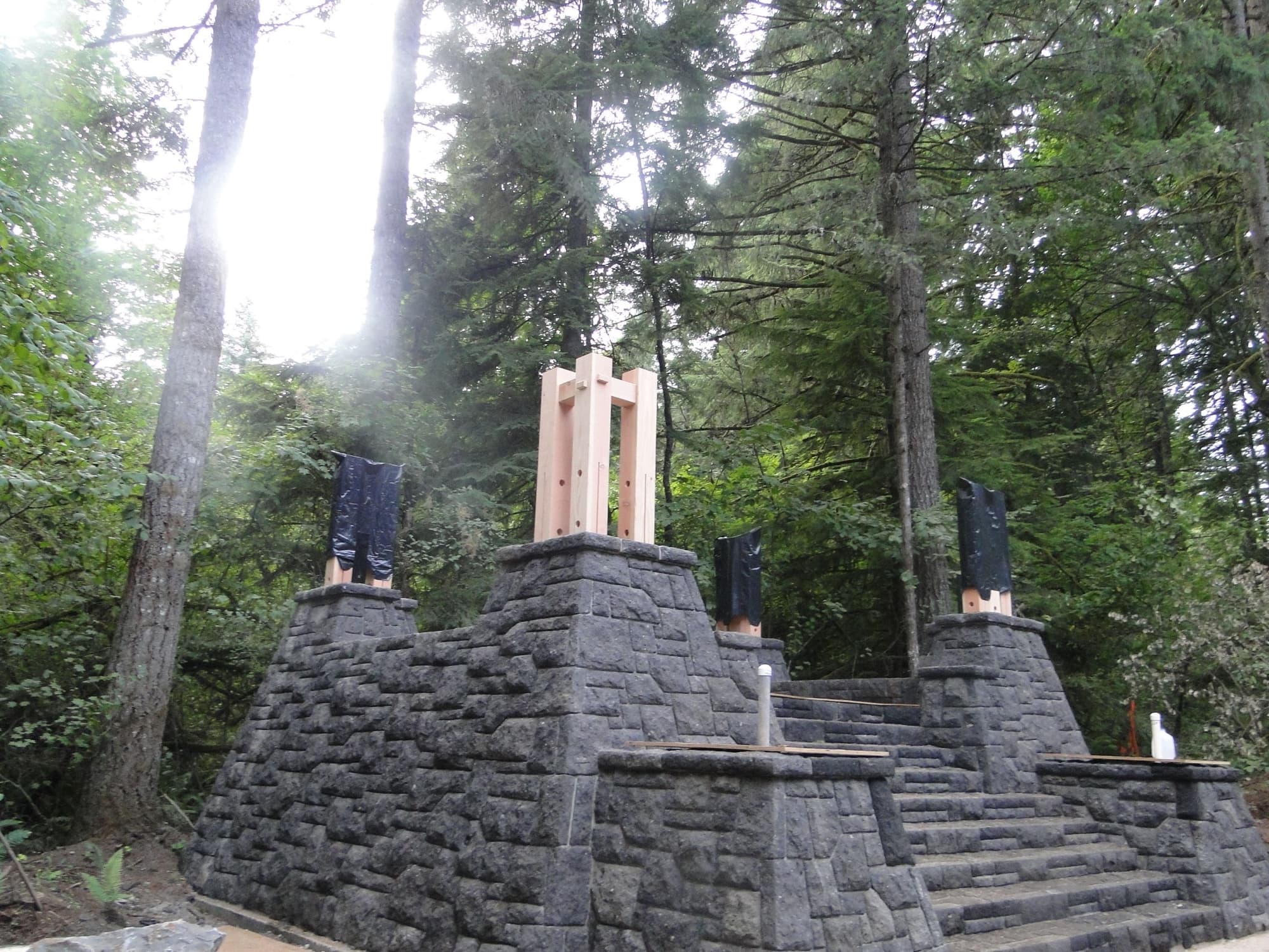 Stone pedestals timber posts
